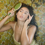 Flat Brush in Virgo model brushing hair with Flat Brush in Virgo