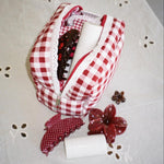 Gingham Pouch in Cherry Kiss Gingham Pouch in Cherry Kiss with assorted emi jay accessories and hair care
