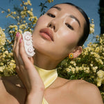 Sweetheart Clip in Puff Blossom model holding Sweetheart Clip in Puff Blossom