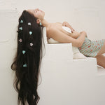 Baby Heart Clip Set in Aqua Love model wearing Baby Heart Clip Set in Aqua Love in hair