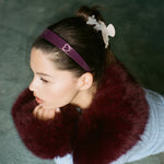 Baby Star Clip Set in Silver Tinsel model wearing headband, sweetheart clip, and Baby Star Clip Set in Silver Tinsel in hair