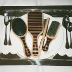 Bamboo Paddle Brush in Nightcap assorted nightcap brushes on dinner tray with utensils