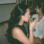 Big Effing Clip in Nightcap model wearing big effing clip in nightcap while drinking martini