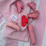 Big Effing Clip in Blush Polka Dot aura hair + body mist in lychee baby with assorted emi jay hair clips on heavenly hair towel