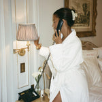 Big Effing Clip in Chantilly model talking on the phone with big effing clip in chantilly in hair