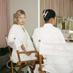 Big Effing Clip in Everyday Angel models in robes sitting in emi jay chairs wearing hair clips
