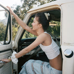 Big Effing Clip in Melon model in truck wearing Big Effing Clip in Melon in hair