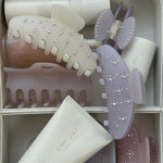 Big Effing Clip in Morning Angel assorted emi jay hair care and accessories in vanity case