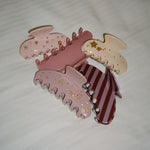 Big Effing Clip in Mulberry Big Effing Clip in Mulberry with assorted hair accessories