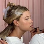 Big Effing Clip in Twilight Angel model wearing Big Effing Clip in Twilight Angel while having makeup applied