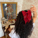 Bow Barrette in Cherry Kiss model wearing Bow Barrette in Cherry Kiss