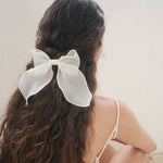 Bow Barrette in Oyster model wearing Bow Barrette in Oyster