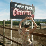 Bow Barrette in Pale Yellow model wearing Bow Barrette in Pale Yellow in hair