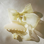 Bow Barrette in Pale Yellow Bow Barrette in Pale Yellow with hair accessories