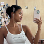 Cloud Popstar Clips in Daydream model with headphones holding phone while wearing emi jay angel tank top and Cloud Popstar Clips in Daydream