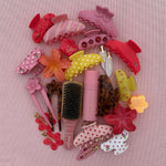 Hair Pin in Tortoise Hibiscus aura hair + body mist in lychee baby with assorted emi jay hair accessories and brush