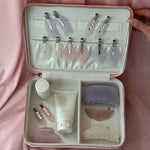 Half Moon Clip in Lilac Smoke vanity case with assorted emi jay hair care and accessories