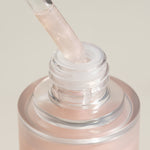 Halo Hair Oil close-up image of dropper with halo hair oil bottle