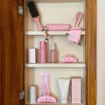 Lil Effing Clip in Rose Petal Eyelet Lil Effing Clip in Rose Petal Eyelet on shelf with assorted emi jay hair care and accessories