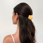Midi Blossom Clip in Peach Bloom model wearing Midi Blossom Clip in Peach Bloom in hair