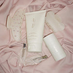 Mini Cloud Clip in Grey Smoke assorted emi jay hair care and accessories on pink fabric