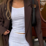 Petite Clip in Toasted model with Petite Clip in Toasted clipped to purse