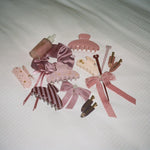 Pin Up Sticks in Mulled Wine assorted Holiday hair accessories and Halo Hair Oil