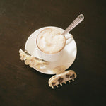 Ponytail Barrette in Chantilly Bloom Ponytail Barrette in Chantilly Bloom with sweetheart clip next to coffee