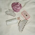 Rosette Scrunchie in Candy Pink Rosette Scrunchie in Candy Pink with assorted hair accessories