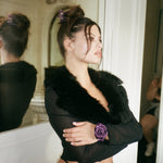 Rosette Scrunchie in Violet model wearing Rosette Scrunchie in Violet on wrist