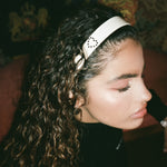 Starlet Headband in Snow closeup of model wearing starlet headband in snow