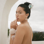 Super Bloom Clip in Aqua Pearl model wearing Super Bloom Clip in Aqua Pearl