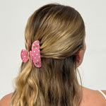 Sweetheart Clip in Lychee Berry Dot model wearing Sweetheart Clip in Lychee Berry Dot in hair