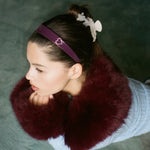 Sweetheart Clip in Cream Angel Wings closeup of model wearing Sweetheart Clip in Cream Angel Wings, baby star clips, and Starlet Headband