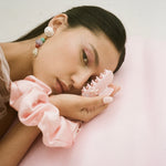 Sweetheart Clip in Pink Water Fairy model holding a Sweetheart Clip in Pink Water Fairy