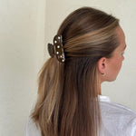 Sweetheart Clip in Toasted Teddy Model wearing Sweetheart Clip in Toasted Teddy in hair.