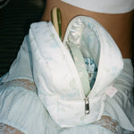 Sweet Like Honey Pouch in Sweet Like Honey model with Sweet Like Honey Pouch in Sweet Like Honey on lap