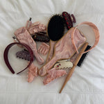 Starlet Headband in Pink Chantilly Wide Starlet Headbands in Pink Chantilly and Cherry Kiss with assorted hair accessories