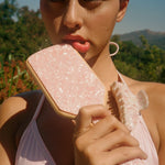 Big Effing Clip in Rose Shell model with Big Effing Clip in Rose Shell and Bamboo Paddle Brush in Bellini