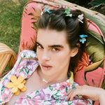 Baby Daisy Clip Set in Jade model wearing Baby Daisy Clip Set in Jade + Petal + Aqua in hair