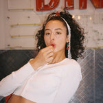 Baby Heart Clip Set in Cherry Kiss model with Baby Heart Clip Set in Cherry Kiss in hair