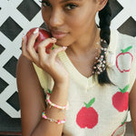 Big Effing Clip in Apple of My Eye model wearing Big Effing Clip in Apple of My Eye on braid