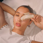 Big Effing Clip in Buttercream model holding a Big Effing Clip in Buttercream