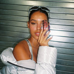 Big Effing Clip in Chrome model holding Big Effing Clip in Chrome