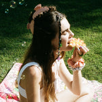 Big Effing Clip in Creamsicle model wearing 2 x Big Effing Clips in Creamsicle in hair