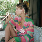 Big Effing Clip in Honeycomb Big Effing Clip in Honeycomb in hair and a second one clipped to robe robe with a Big Daisy Clip in Marshmallow