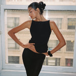 Big Effing Clip in Noir model standing with Big Effing Clip in Noir in hair