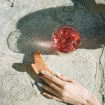 Big Effing Clip in Orange Cabana model reaching for Big Effing Clip in Orange Cabana