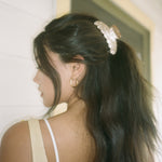 Big Effing Clip in Sagittarius closeup of Big Effing Clip in Sagittarius in hair