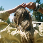 Big Effing Clip in Brownstone Close up of model with Big Effing Clip in Brownstone + Sagittarius in hair